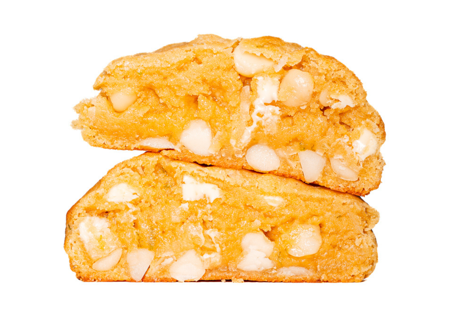 bakery style coconut lime macadamia cookies cut open